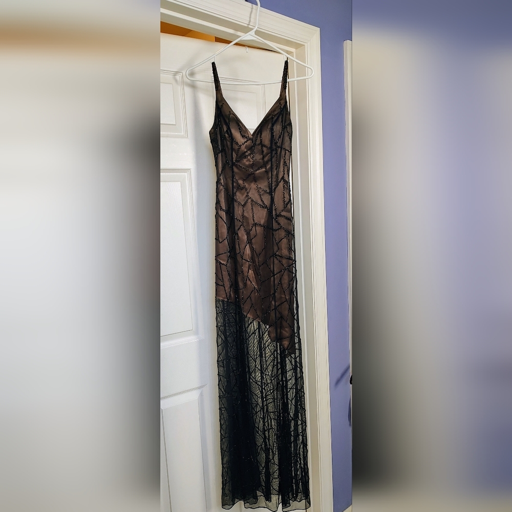 Long, sequined & sheer beautiful black evening dress.